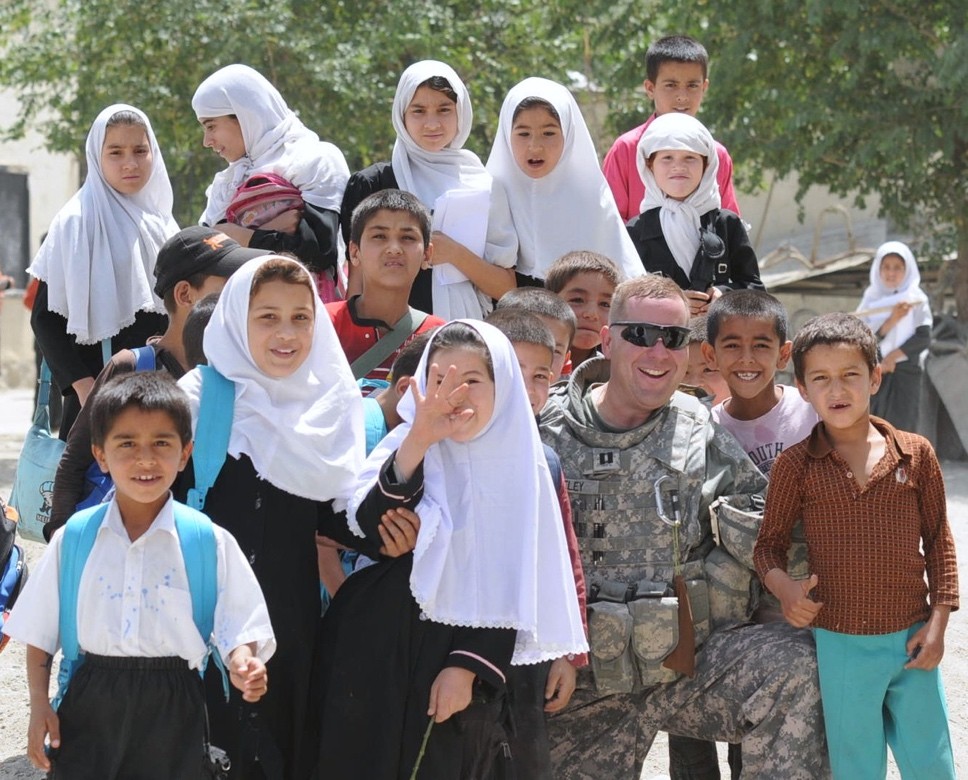 Superintendent Chris Neeley in Afghanistan with Children